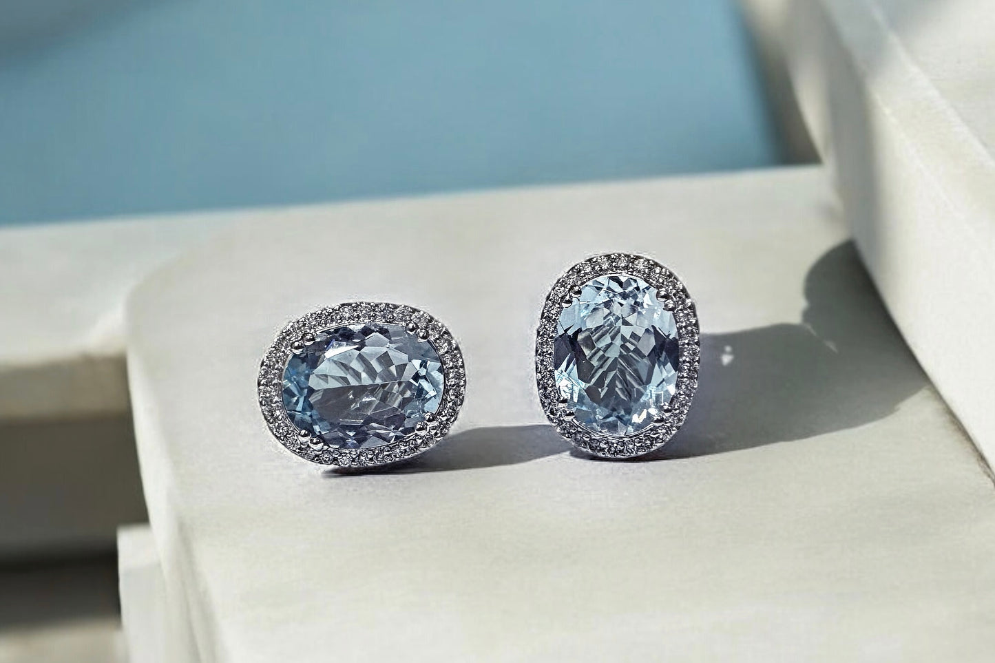 LIGHT BLUE TOPAZ & DIAMONDS