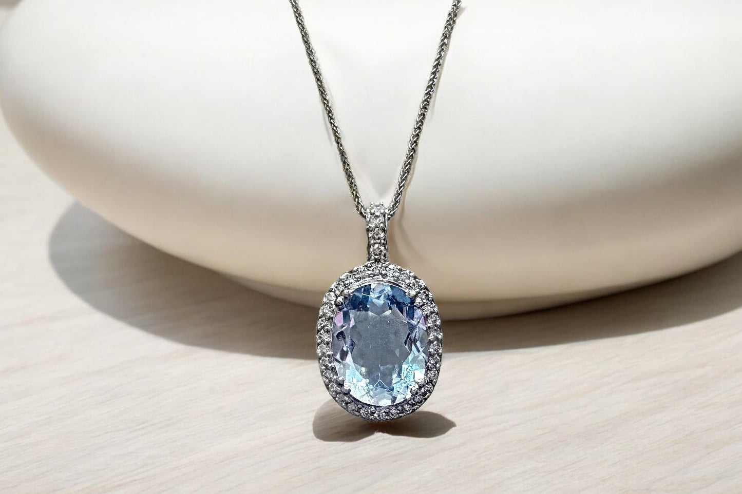 LIGHT BLUE TOPAZ & DIAMONDS