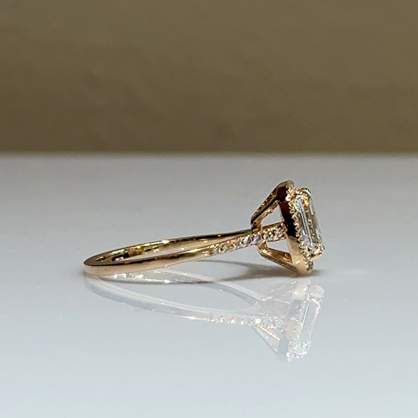 1,01 CT EMERALD GESLEPEN HALO RING 