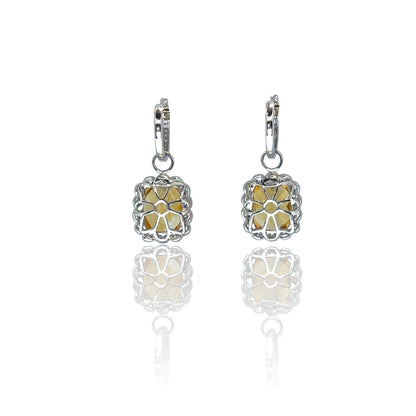 Boucles d'oreilles pendantes en topaze et diamant
