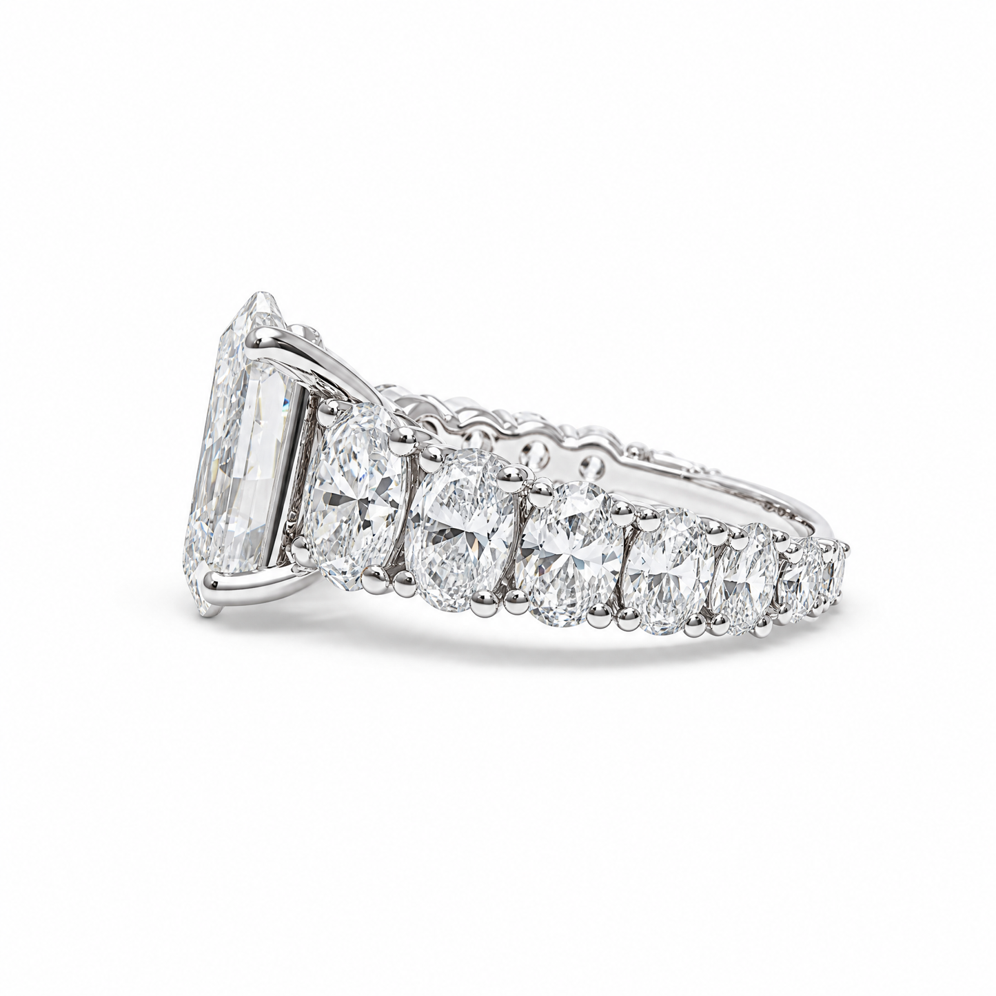 3.04 CT OVAL WITH SIDE DIAMONDS