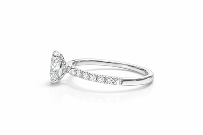 1.01 CT OVAL WITH SIDE DIAMONDS