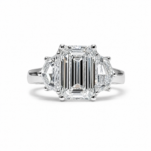 3.03 CT EMERALD CUT THREE STONE RING