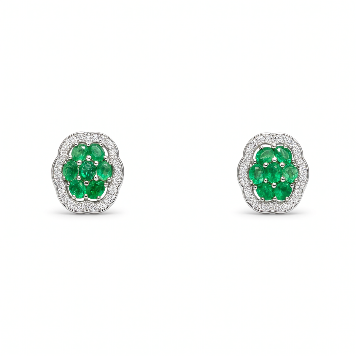 Boucles d'oreilles vintage en émeraude de forme ovale